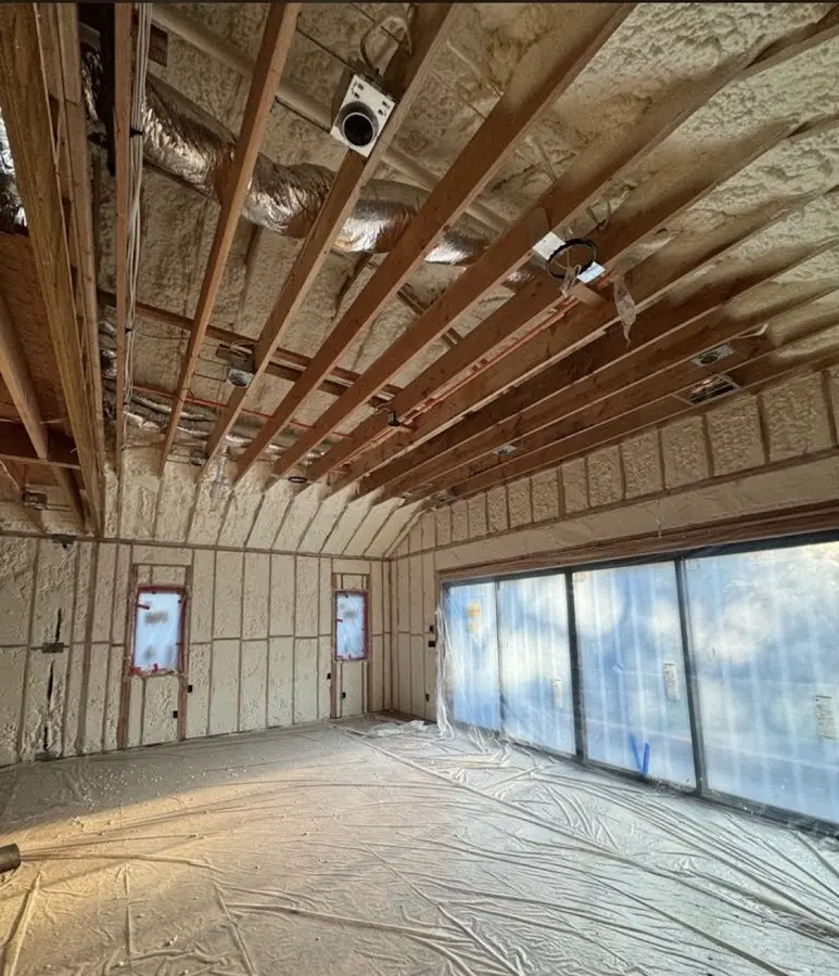 Interior walls and ceiling insulated with spray foam during new construction in Richland